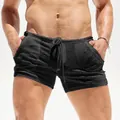 Macro view of men's breathable black casual shorts with functional drawstring detail - 3XL / Bottoms / Black