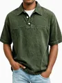 Detailansicht eines Herren Vintage Acid-Wash Poloshirts in Dunkelgrün mit Reverskragen - Armeegrün