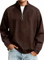 Close-up detail of vintage brown half-zip sweatshirt for men with washed-out texture. - Coffee