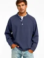 Professional close-up of men's vintage faded blue Henley long sleeve shirt with buttons - Navy Blue