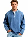 Detail showing vintage washed blue denim texture on men's Henley shirt - Blue