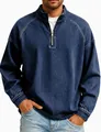 Close-up of men's vintage washed denim quarter-zip pullover with metal zipper detail. - Navy Blue