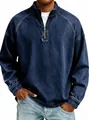 Close-up of men's vintage washed denim quarter-zip pullover with metal zipper detail. - Navy Blue