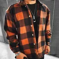 Detail view of men's casual orange and black checkered long-sleeve shirt texture - S / Tops / Orange Black Plaid