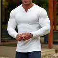 Close-up of men's white ribbed long sleeve T-shirt with textured slim fit notch neck. - S / Tops / White