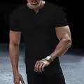 Close-up of men's muscle fit black t-shirt featuring a notch neck and curved hemline. - Black