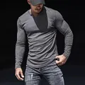 Men's grey ribbed long sleeve T-shirt with slim fit design and notch neck. - Gray