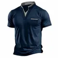 Close-up view of navy blue men's Henley t-shirt featuring grey stand collar and pocket - S / Tops / Navy Blue