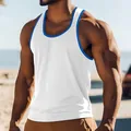 Macro detail of a white men's slim fit sports tank top featuring blue contrast trim accents - S / Tops / White