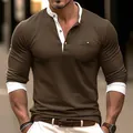 Detailed view of men's brown long sleeve Henley shirt with white contrast collar and pocket - S / Tops / Dark Brown