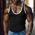 Detailed view of men's ribbed black tank top with white contrast trim and slim fit design - S / Tops / Black