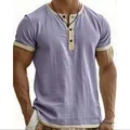 Close-up detail of a vintage colorblock Henley t-shirt with textured fabric - Light Purple