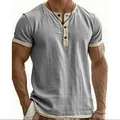 Close-up of vintage grey Henley shirt with contrast beige trim and textured fabric - S / Tops / Light Gray