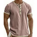 Close-up of retro color-block Henley shirt featuring textured linen-like fabric - S / Tops / Pink