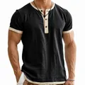 Detail of men's vintage Henley t-shirt with contrast collar and button placket - S / Tops / Dark Gray