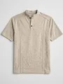 Detailed view of oatmeal heathered men's henley shirt with stand collar and buttons - S / Apricot