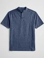 Close-up of a blue knit Henley shirt showing the stand collar and button placket details. - Navy Blue