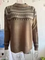 Close-up detail of winter brown half-turtleneck sweater with Fair Isle pattern print - 2XL / Tops / Apricot