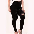 High-waisted black ripped skinny jeans for women featuring heavy distressed frayed details - 3XL / Bottoms / Black