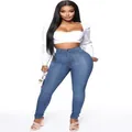 Stylish high-waisted blue denim skinny jeans for women with a slim pencil cut design - S / Bottoms / Medium Blue