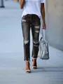 Women's black distressed straight-leg denim jeans with ripped details and frayed hem - S / Bottoms / Black