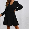 Elegant black wrap dress with lantern sleeves and a self-tie waist belt detail - S / Black