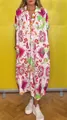Detail showing vibrant bohemian paisley print on a loose lapel maxi dress. - S / Tops / Red