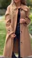 Close-up of an elegant camel long wool blend coat featuring classic tortoise buttons. - S / Tops / Tan