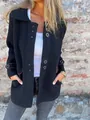 Detail shot of black lapel single-breasted long-sleeved coat for women on model - S / Tops / Black