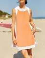 Close-up of summer orange and white color-block terry cloth sleeveless top on model - Orange Red