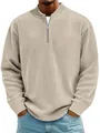 Close-up of beige ribbed corduroy long-sleeve polo shirt with quarter-zip collar - S / Tops / Apricot