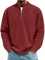 Detail view of the ribbed corduroy texture and quarter-zip collar of this burgundy polo shirt - S / Tops / Brick Red