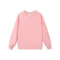Sweat-shirt rose uni à col rond avec épaules tombantes dans une coupe décontractée chic. - Rose