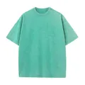 T-shirt oversize vintage in cotone verde menta con effetto acid wash e trama a neve - Verde erba