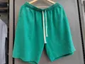 Vintage green acid-washed cotton shorts with comfortable elastic drawstring waist - S / Bottoms / Grass Green