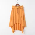 Detailed view of an oversized orange hooded poncho featuring a wide kangaroo pocket - S / Tops / Yellow