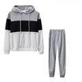 Two-piece casual set with color block hoodie and grey joggers on white background - S / Top And Bottom / Black