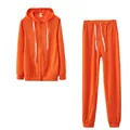 Front view of solid orange zip-up hoodie and matching joggers set on white background - S / Top And Bottom / Orange
