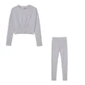 White two-piece athletic set featuring long-sleeved cropped top and matching leggings - White