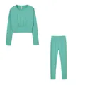 Flat lay view of a mint green women's long-sleeve crop top and leggings sports set. - Lake Green