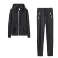 Detailed view of women's black zip-up hoodie and matching joggers tracksuit set - Black