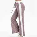 Detailed side view of women's casual wide-leg lounge pants with white side stripes - M / Bottoms / Pink