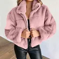 Detailed view of the soft pink faux fur texture on a zip-up winter jacket - XL / Tops / Pink