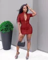 A model wearing a dark red slim-fit mini dress featuring a front zipper detail - S / Top And Bottom (HW007) / Burgundy