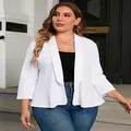 Detailed view of women's plus size casual white blazer featuring elegant ruffle hem design - 2XL / Tops / White