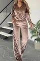 Detailed view of women's mauve velvet tracksuit featuring leopard print contrast panels - S / Top And Bottom / Khaki
