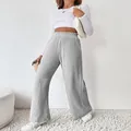 Close-up of women's grey ribbed knit wide-leg trousers for autumn and winter - S / Bottoms / Light Gray