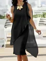 Elegante zwarte mouwloze chiffon jurk met een chique onregelmatige gelaagde zoom detail. - S / Tops / Zwart