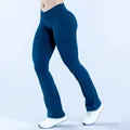Women's blue high waist crossover seamless yoga flare pants for fitness and running - XS / Bottoms / Teal