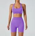 Full view of the purple seamless yoga set with halter sports bra and high-waisted shorts - Purple
